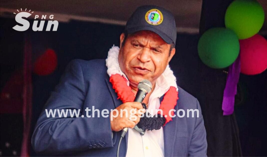 Peter Nupiri speaking on the microphone. PNG SUN post image