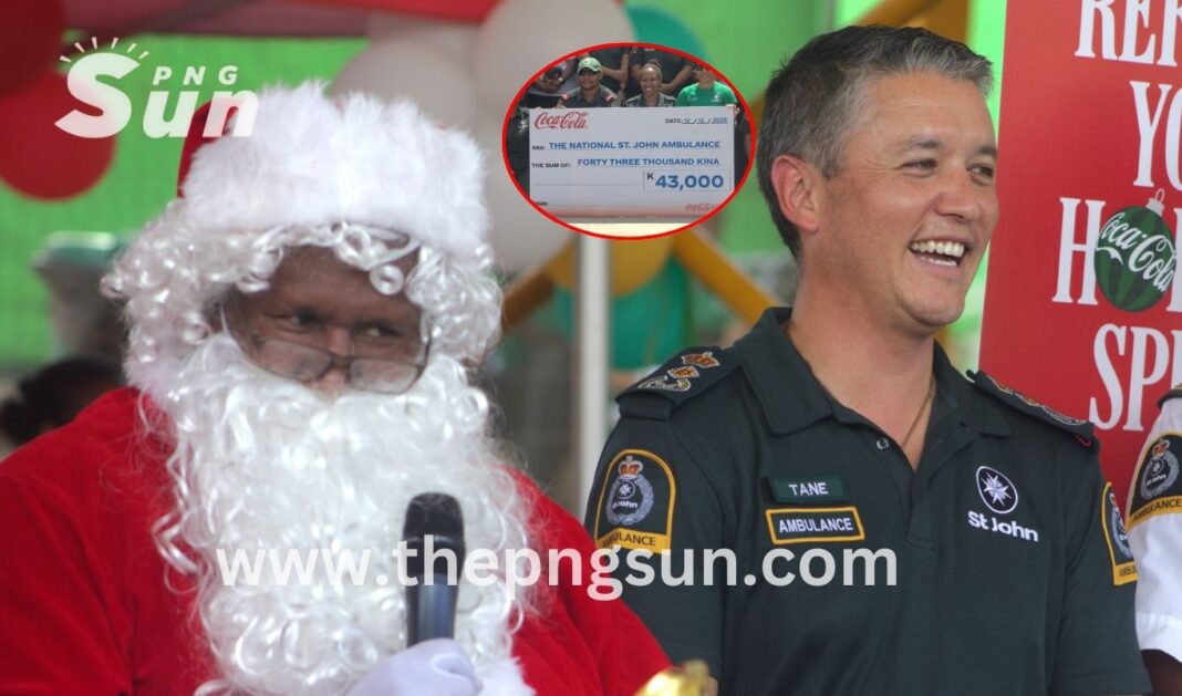 Christmas Father with St John Ambulance medical director Dr Mangu.